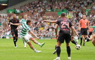 Luke McCowan of Celtic celebrates