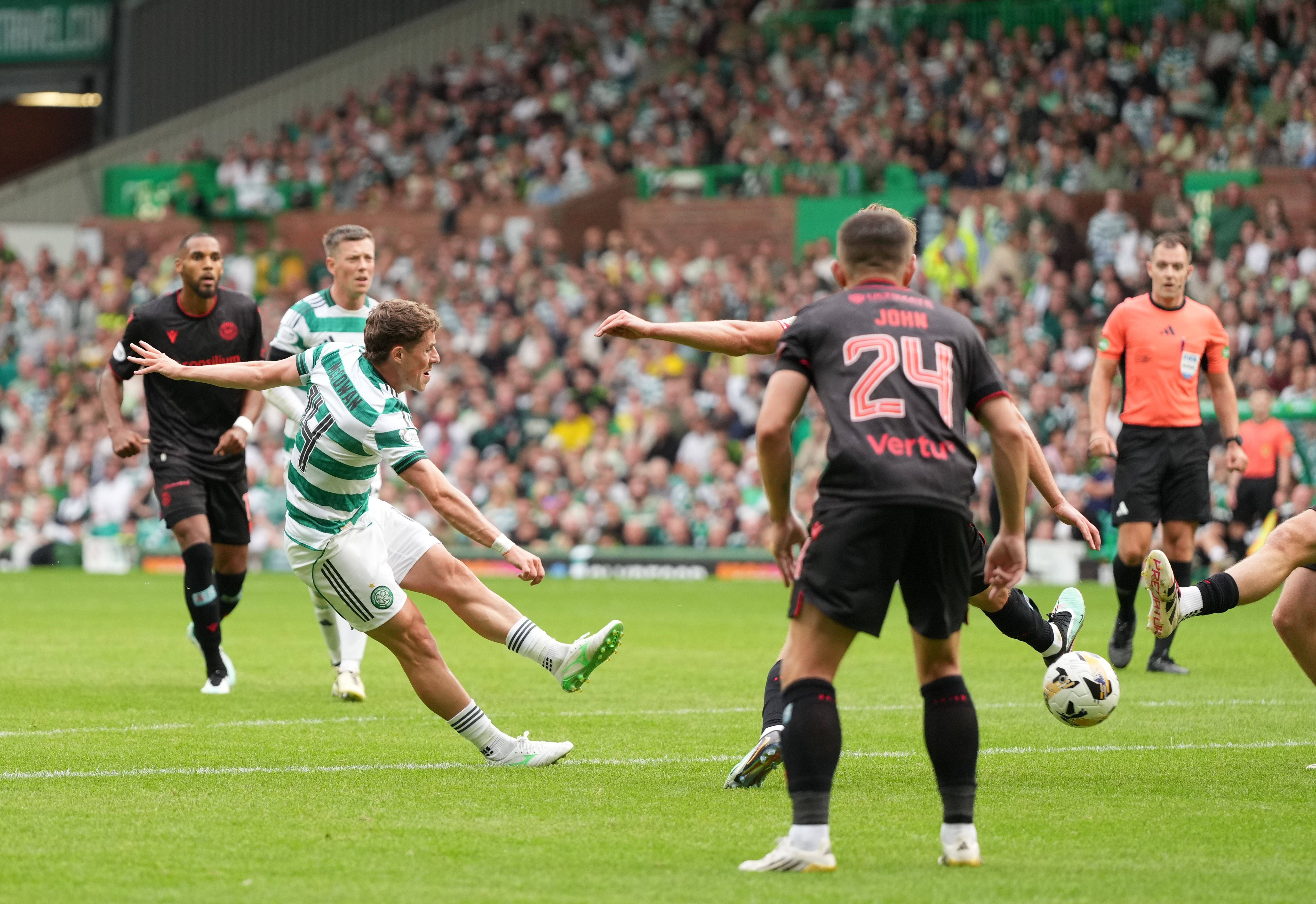 Luke McCowan of Celtic celebrates