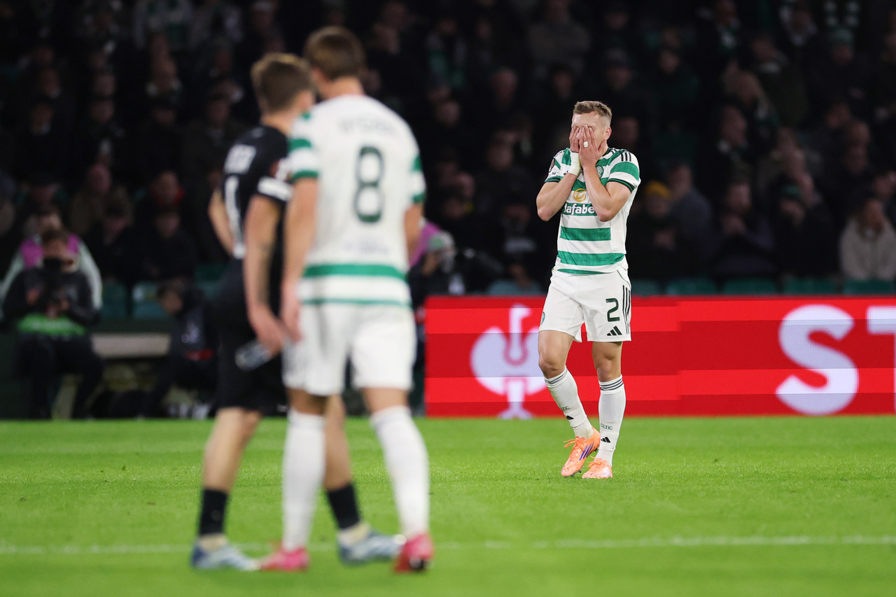 Alistair Johnston of Celtic looks dejected