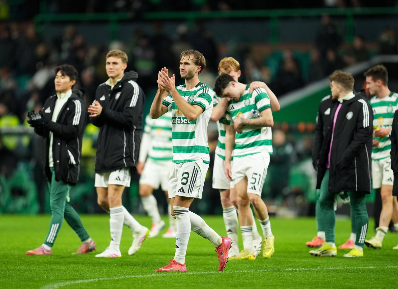 Benjamin Nygren of Celtic applauds the fans