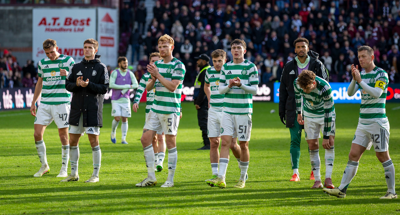 Celtic players applaud the Celtic support after the 3-1 defeat to Hearts at Tynecastle.