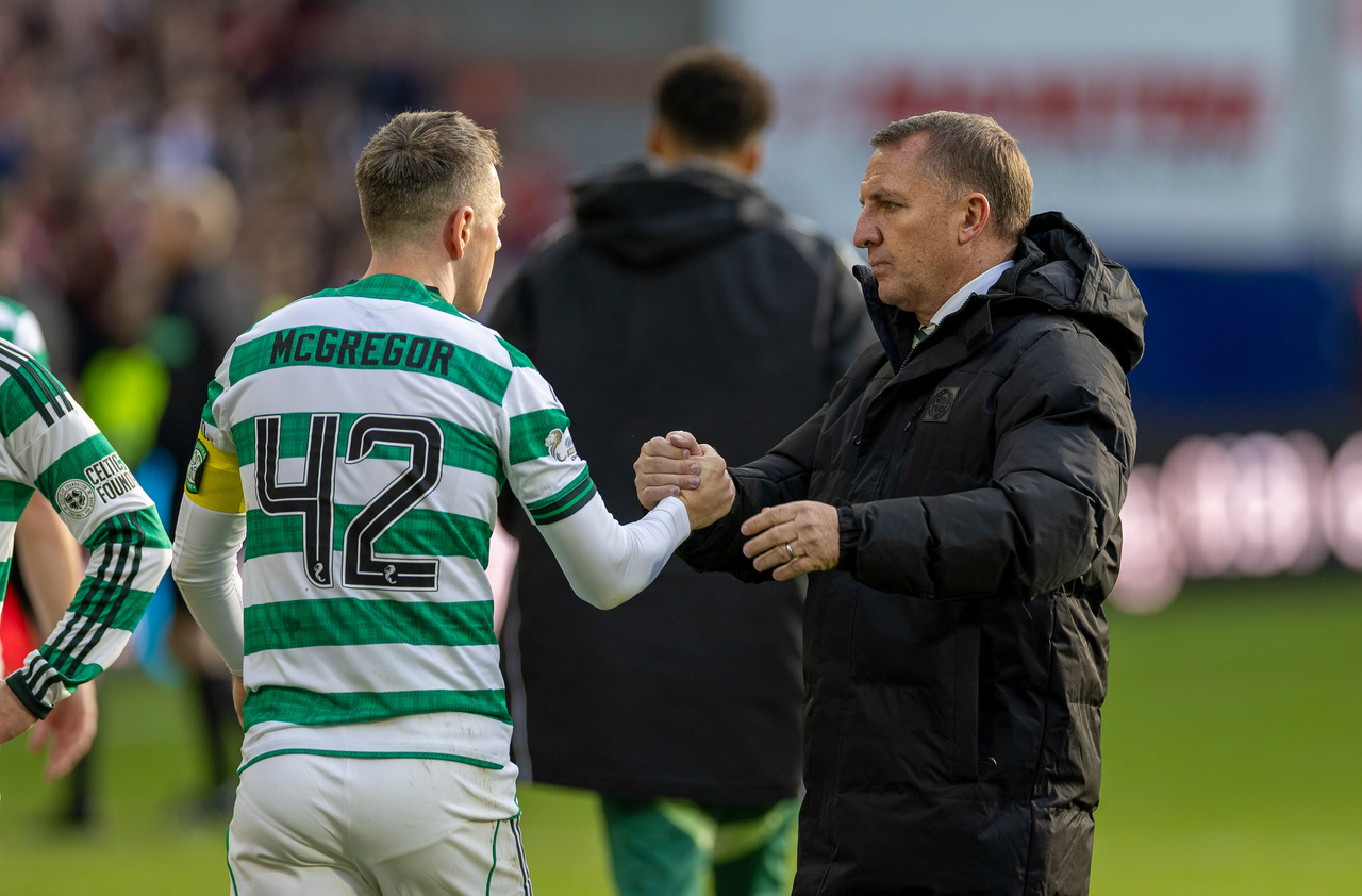 Callum McGregor shakes hands with Brendan Rodgers