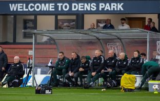 Brendan Rodgers on the Celtic bench at Dens Park.