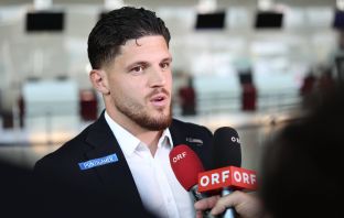 Emir Karic of SK Sturm Graz at airport heading to Glasgow.