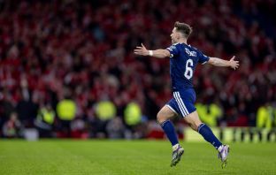 Kieran Tierney celebrates after scoring for Scotland