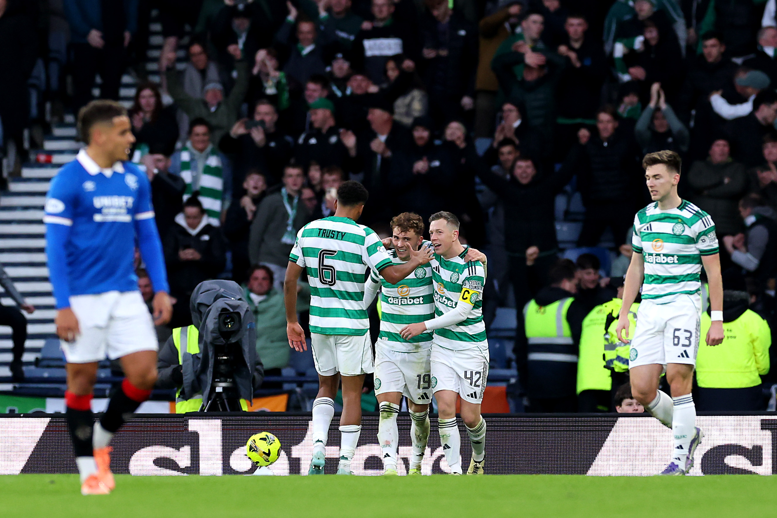 Callum Osmand of Celtic celebrates