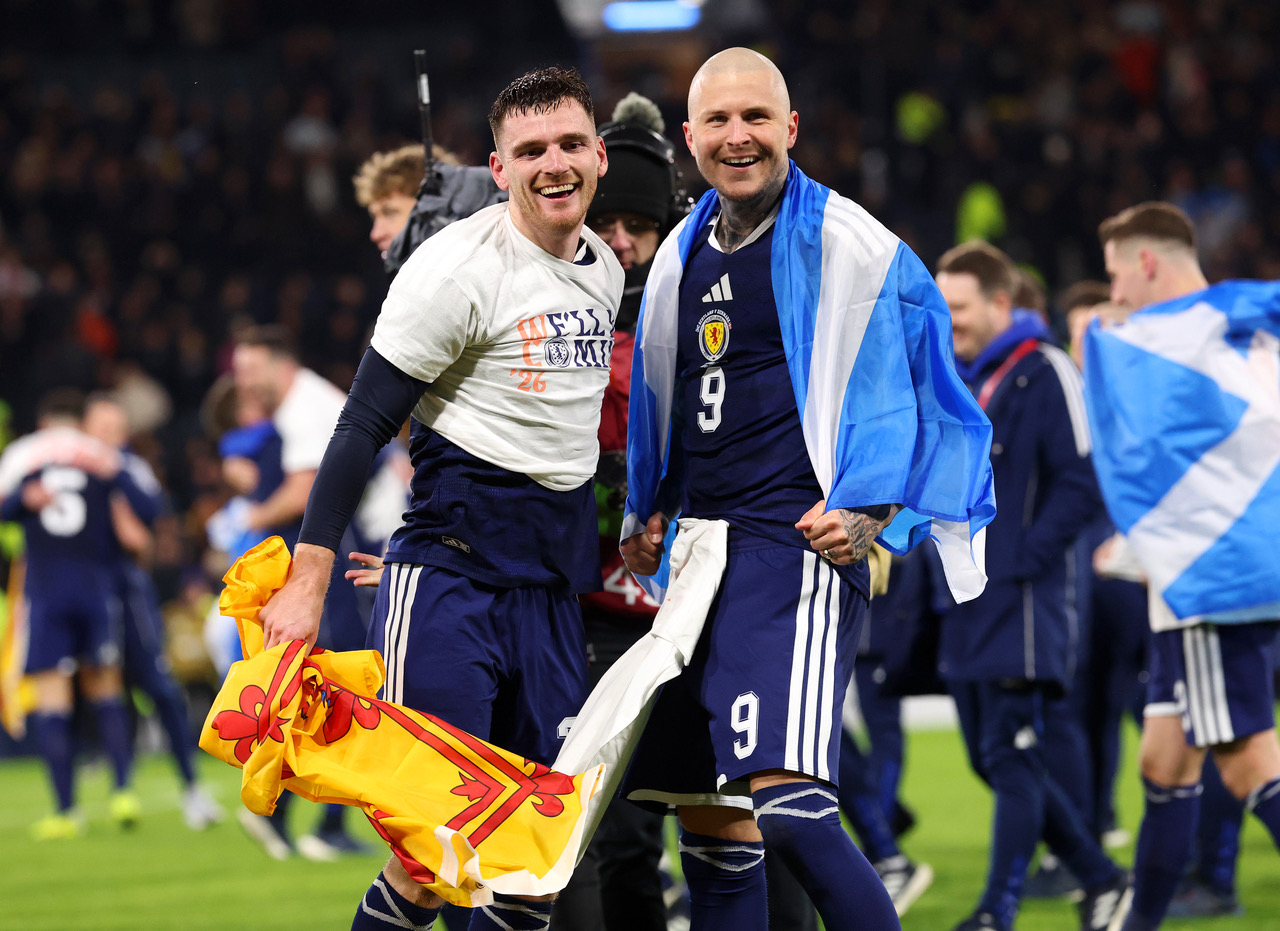 Lyndon Dykes and Andy Robertson of Scotland celebrate