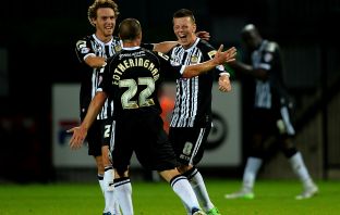 Callum McGregor of Notts County celebrates with Mark Fotheringham