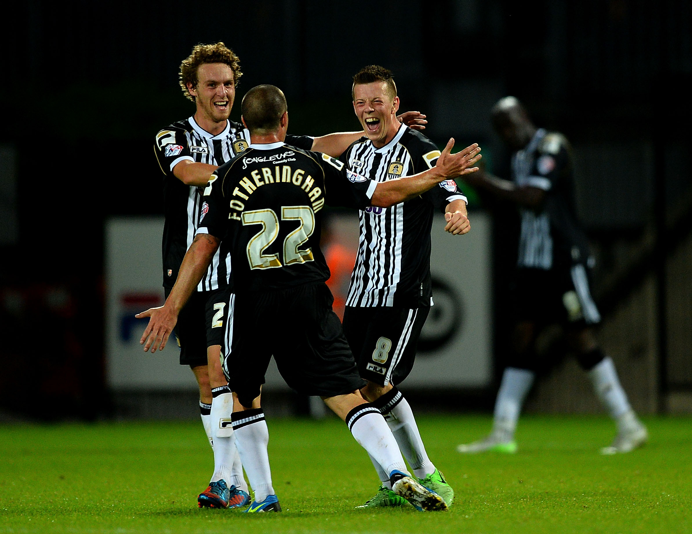 Callum McGregor of Notts County celebrates with Mark Fotheringham