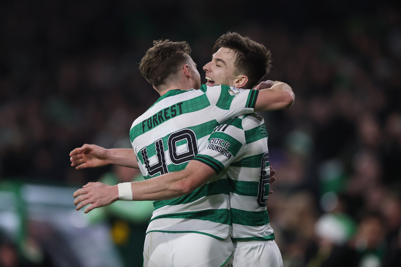 Kieran Tierney and James Forrest celebrate