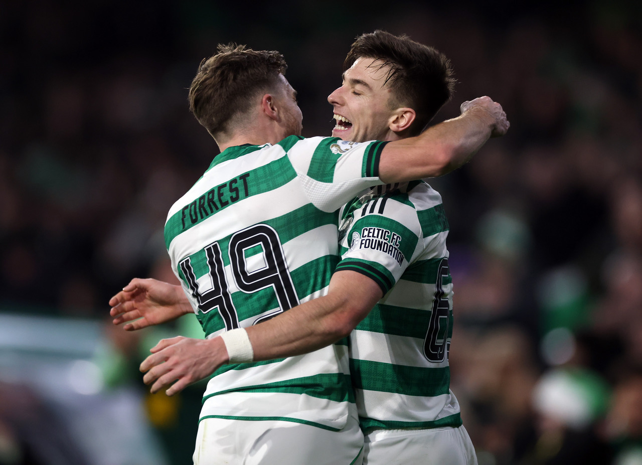 Kieran Tierney and James Forrest celebrate