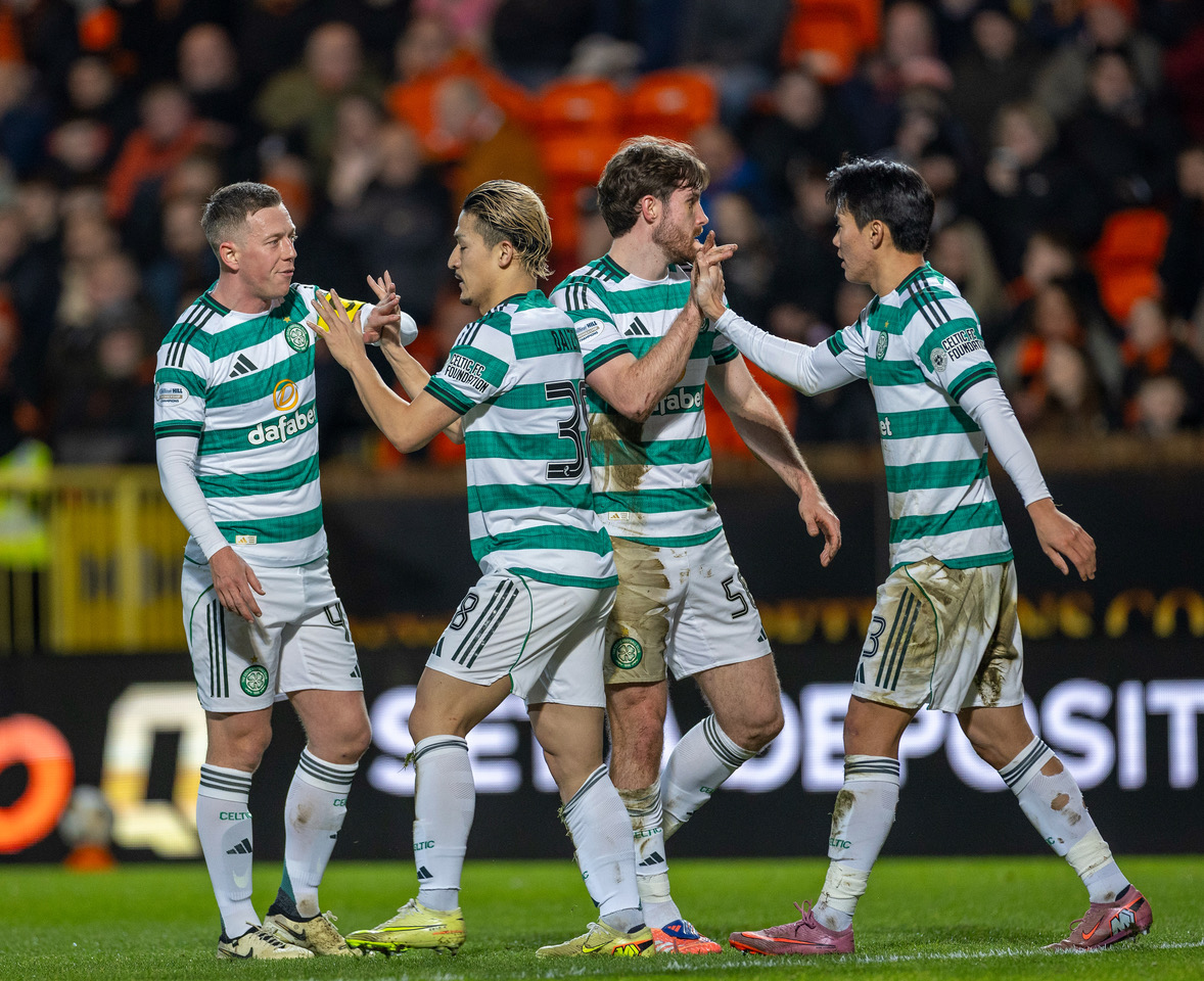 Celtic players including Yang celebrate Daizen Maeda's opening goal.