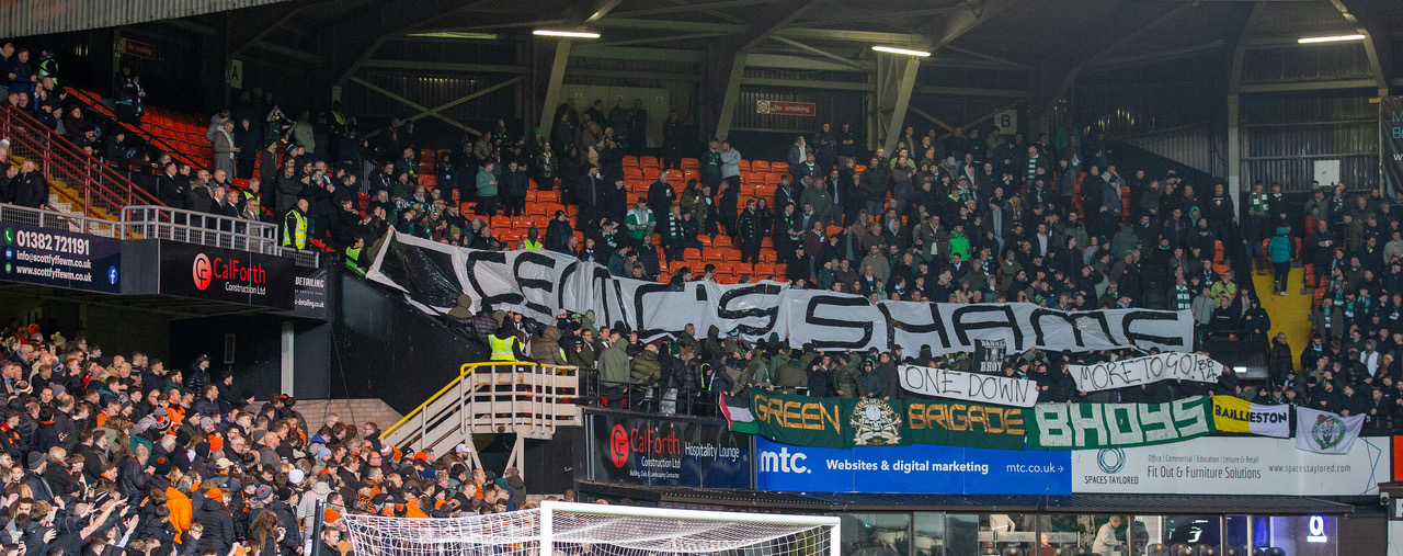 Celtic's Shame banner pointing at Celtic Board at Tannadice