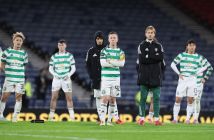 Callum McGregor and Celtic teammates look on