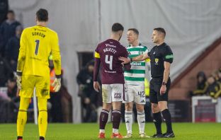 Callum McGregor gets booked by Steven McLean