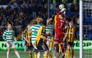 Auchinleck Talbot's goalkeeper William Muir punches the ball clear