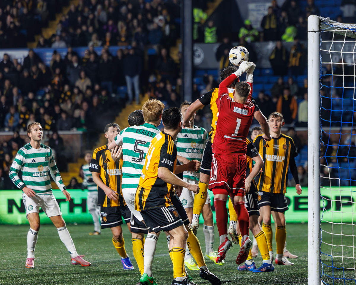 Auchinleck Talbot's goalkeeper William Muir punches the ball clear