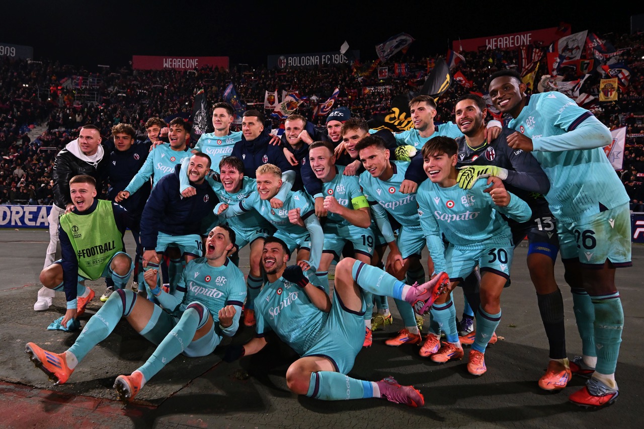 Players of Bologna FC celebrate 