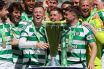 Callum McGregor and James Forrest of Celtic lift the League trophy