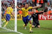Henrik Larsson of Sweden celebrates scoring against England