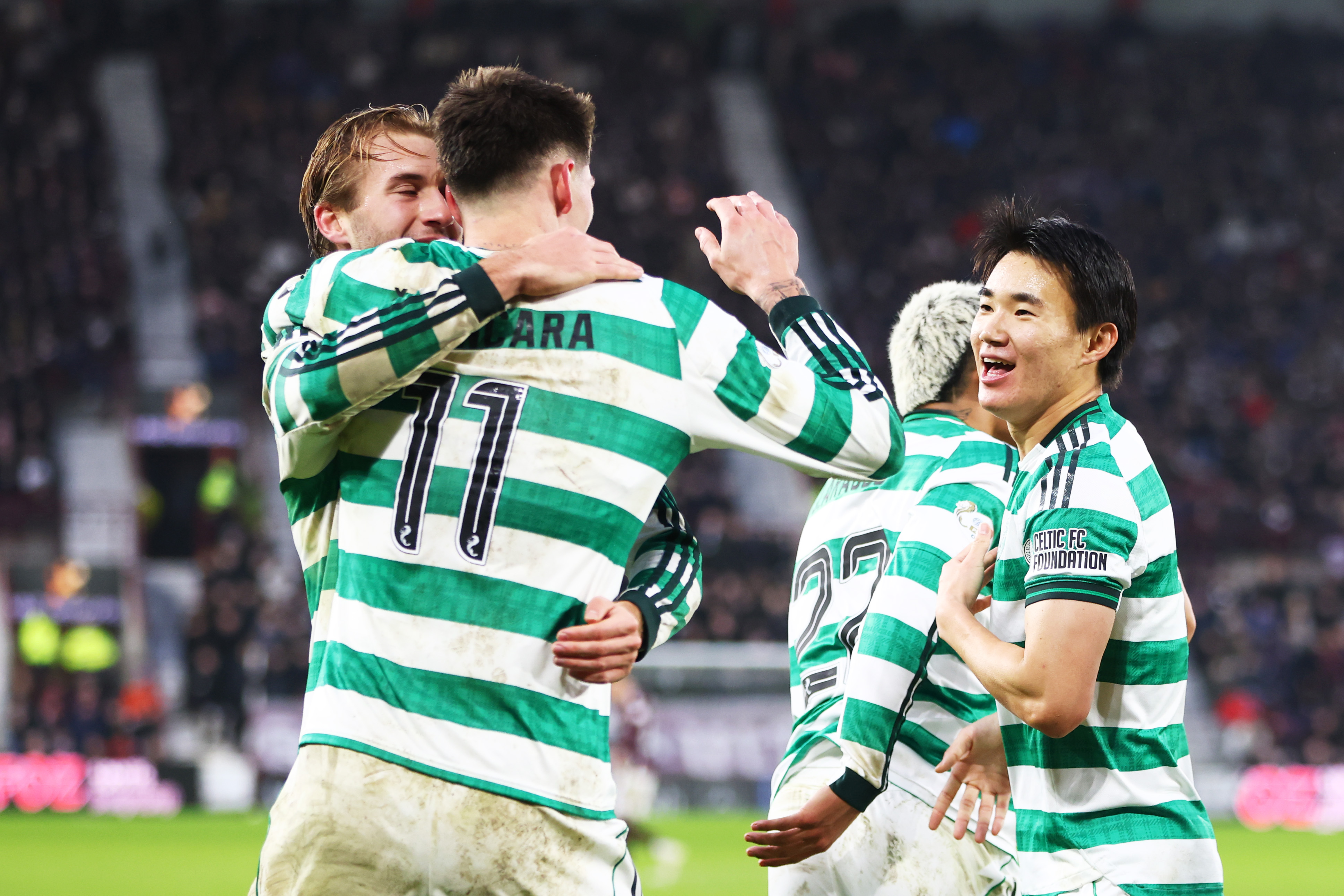 Tomas Cvancara, Benjamin Nygren and Hyunjun Yang of Celtic celebrate