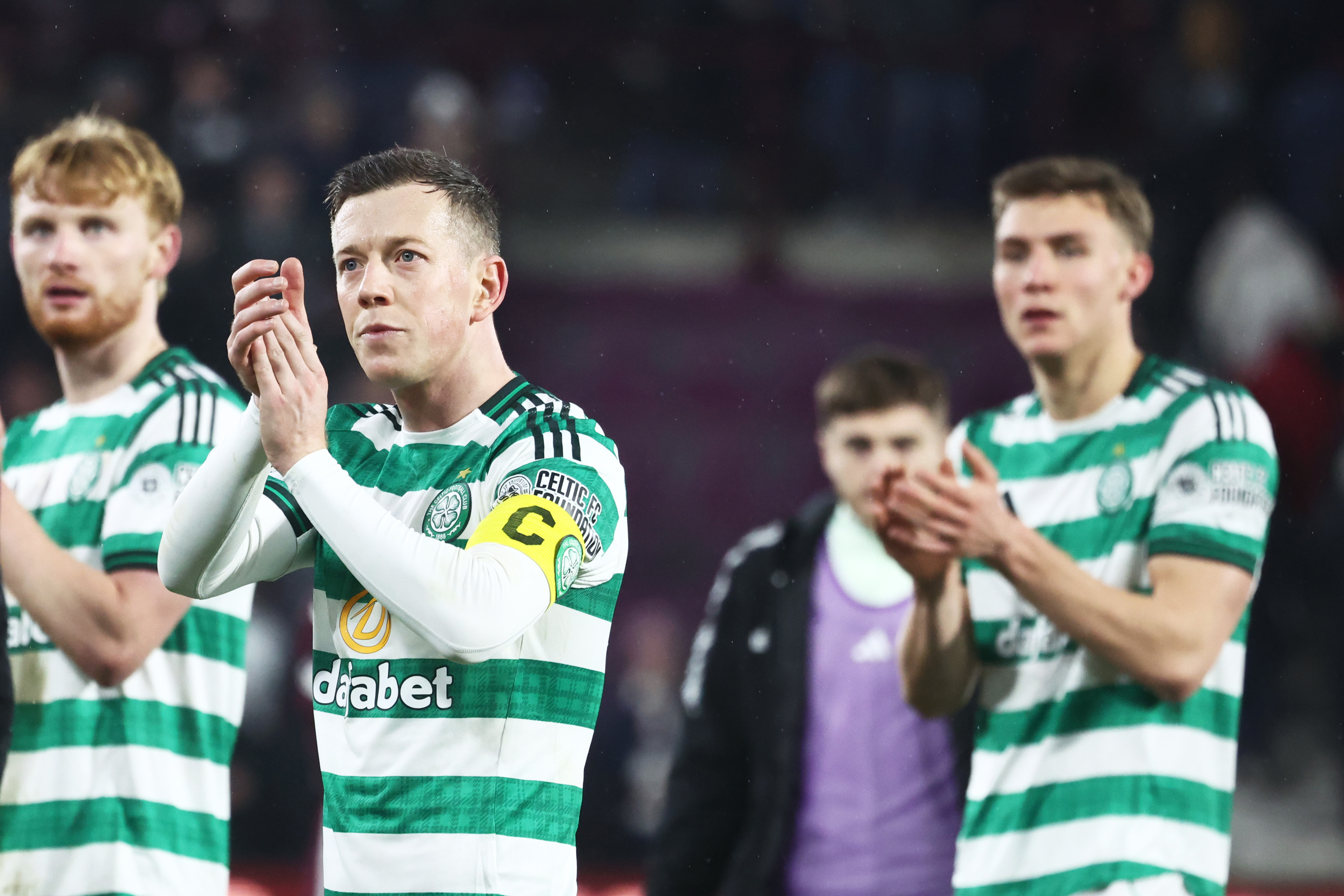 Callum McGregor applauds the Celtic fans 