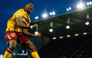 Tawanda Maswanhise celebrates