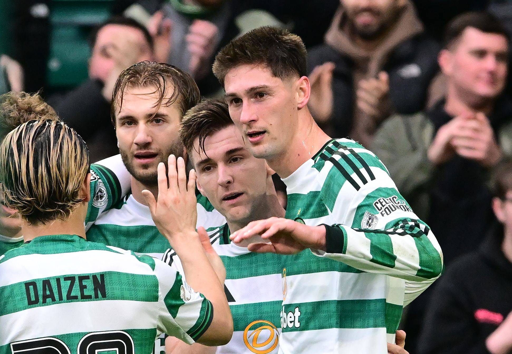 Tomas Cvancara of Celtic celebrates with Kieran Tierney