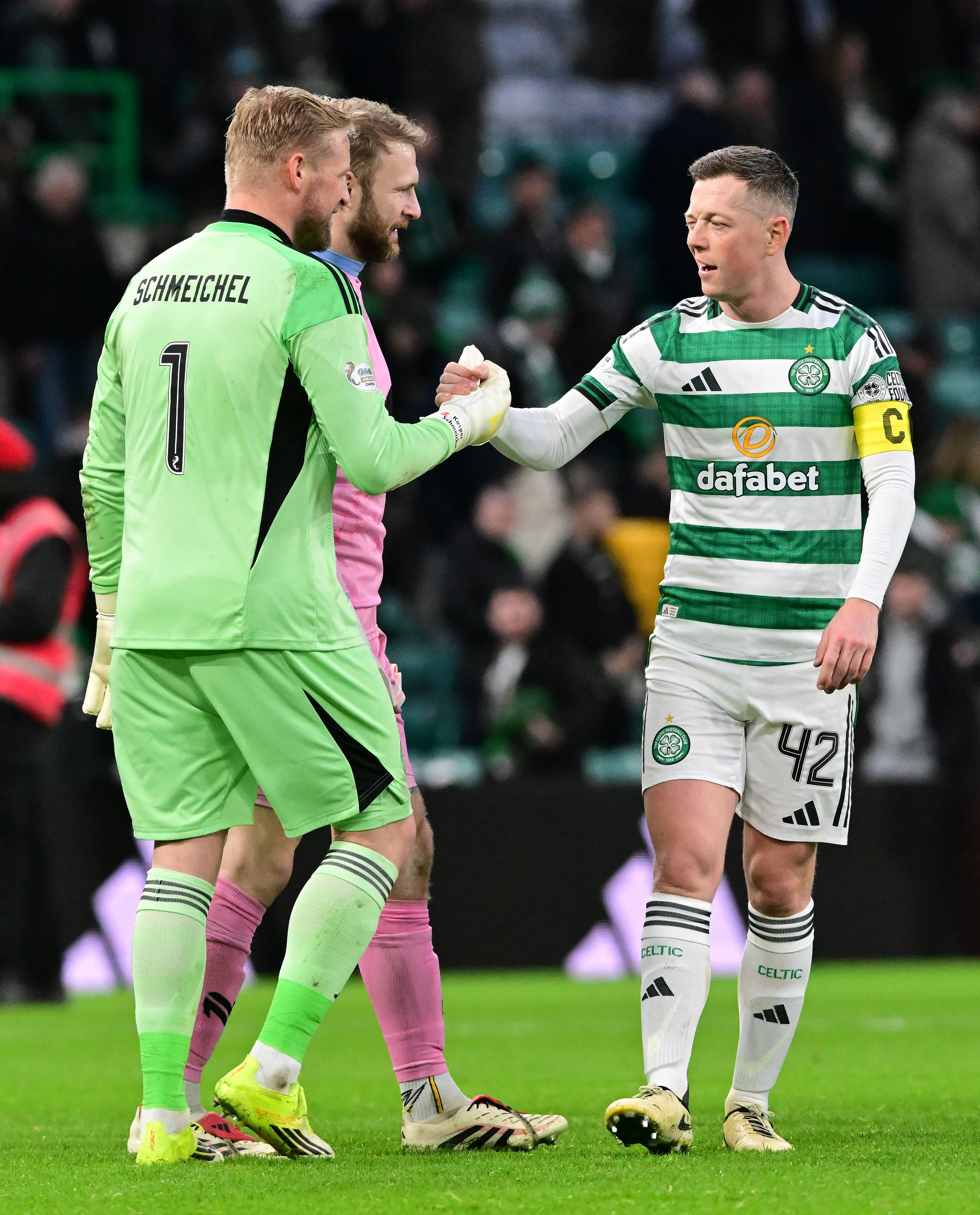 Callum McGregor of Celtic and Kasper Schmeichel
