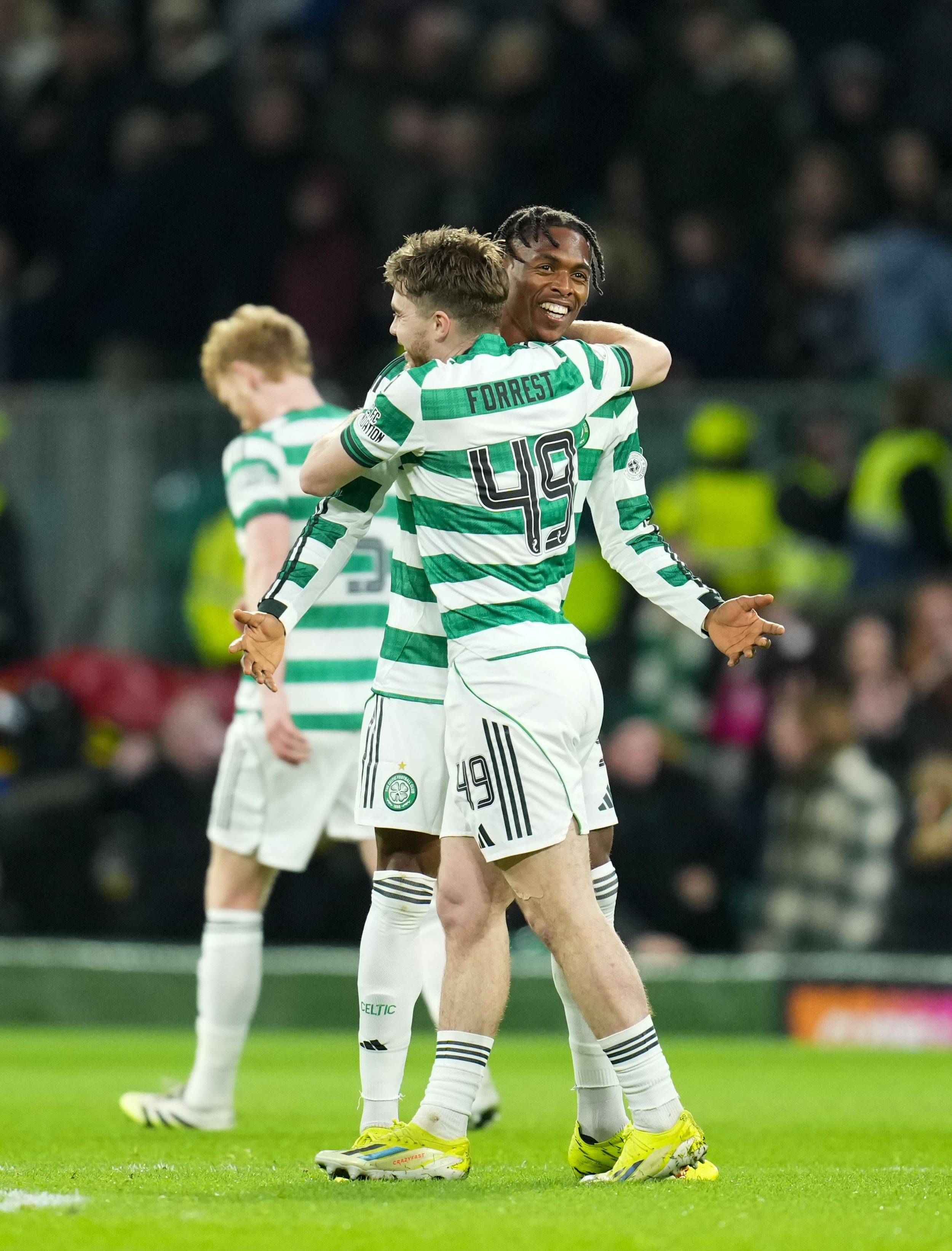 Junior Adamu celebrates with James Forrest