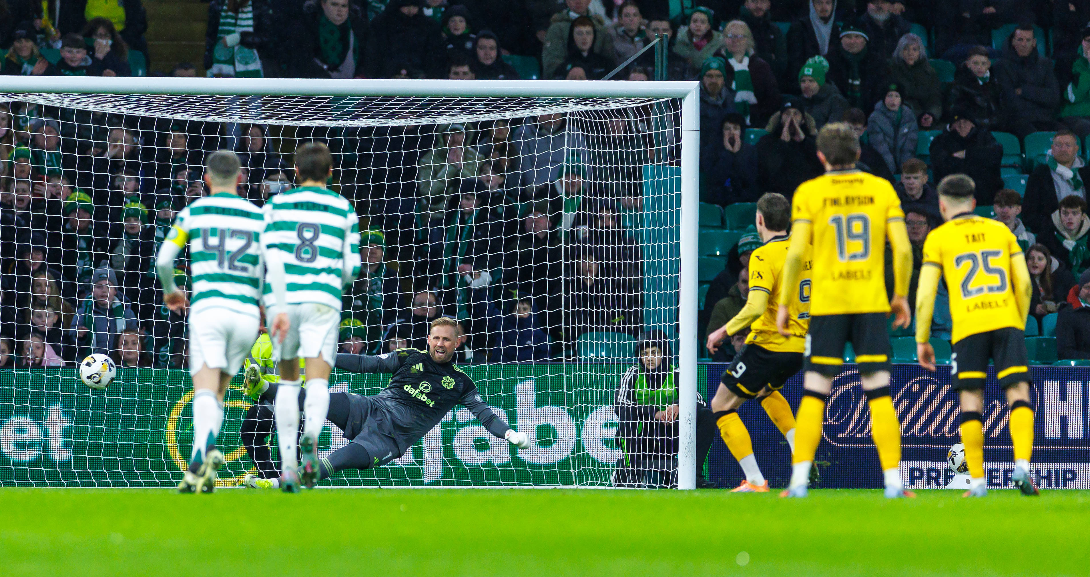 Robbie Muirhead scores the penalty for Livingston