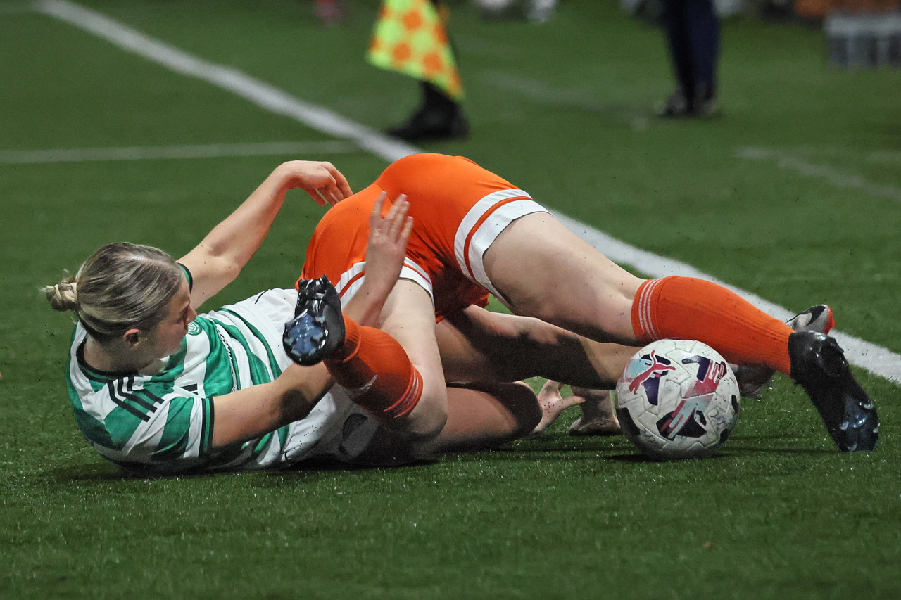 Maria McAneny battles for the ball.