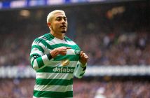 Julian Araujo holds the Celtic badge