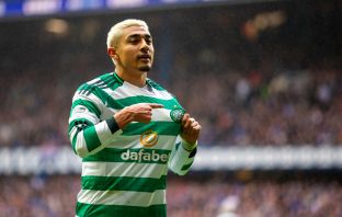 Julian Araujo holds the Celtic badge