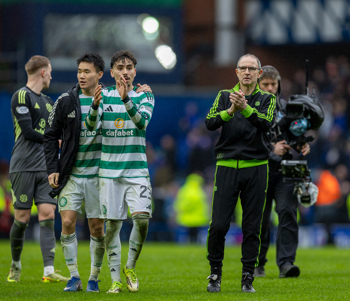 Martin O'Neill applauds the Celtic support