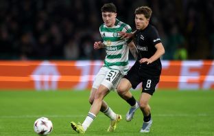 Colby Donovan of Celtic battles for possession with Filip Rozga of Sturm Graz