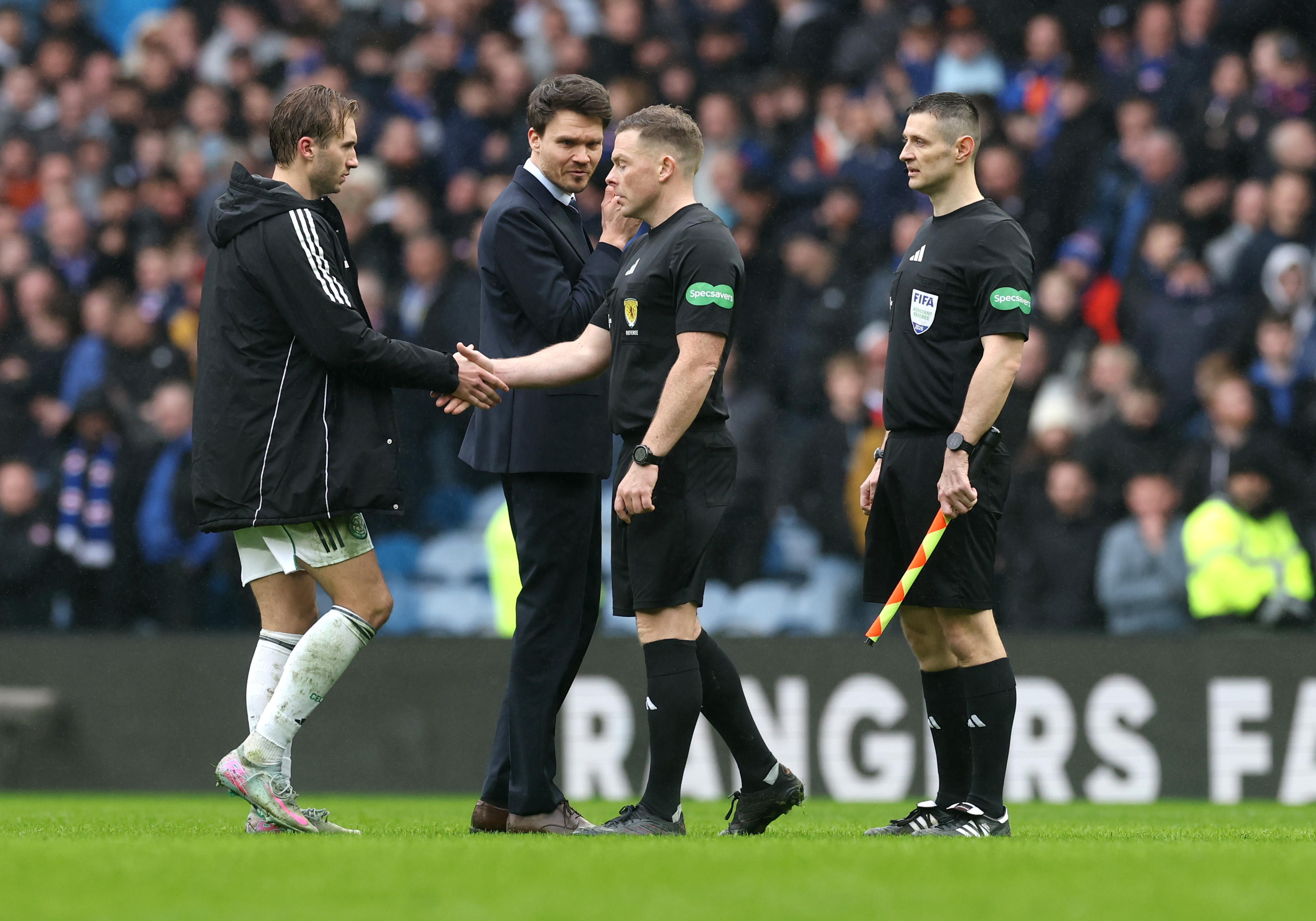 Danny Rohl, Head Coach of theRangers, stares at Referee John Beaton