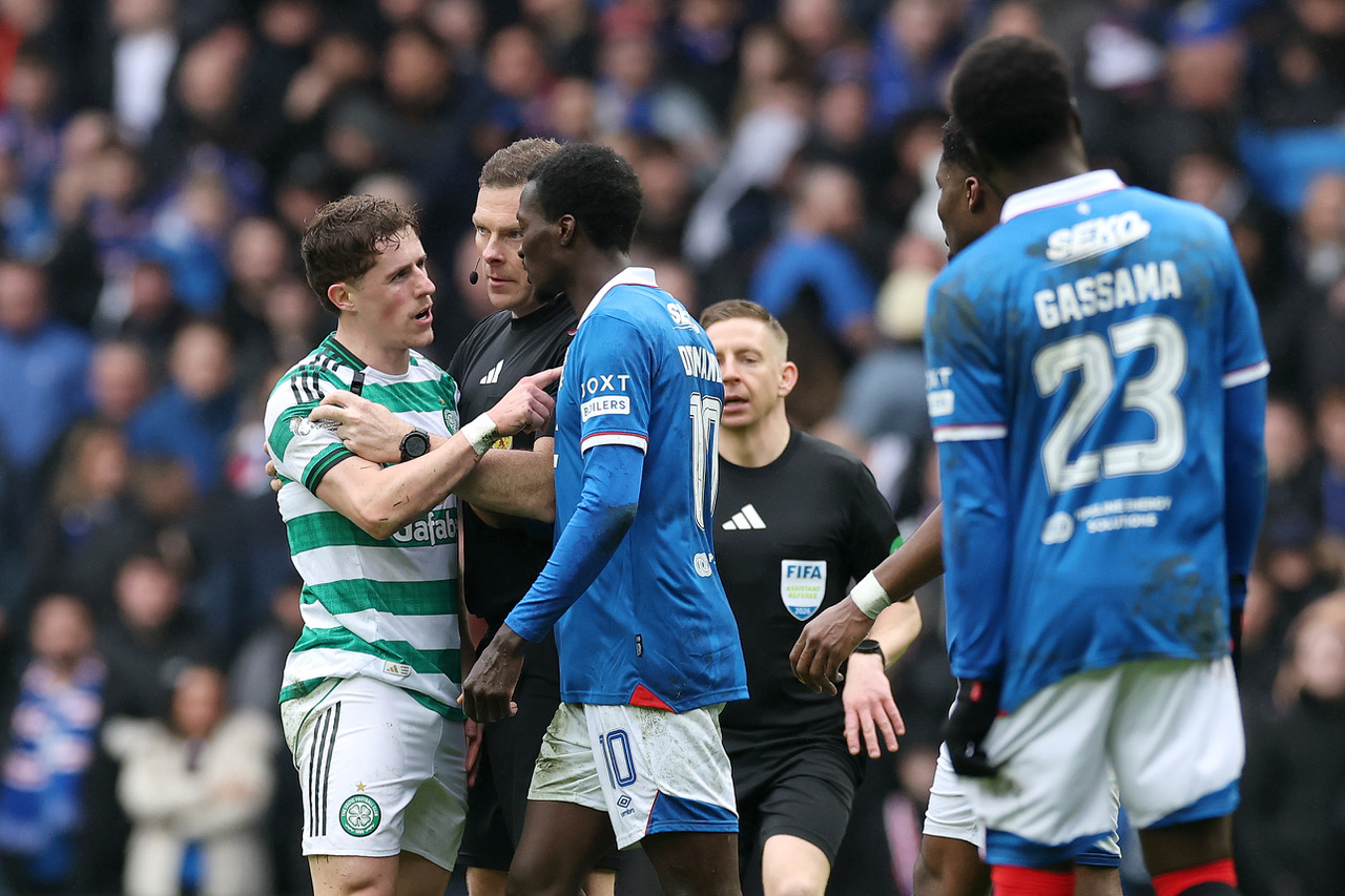 Referee John Beaton intervenes as Luke McCowan of Celtic clashes with Mohammed Diomande of theRangers