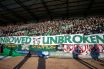 Unbowed. Unbroken - The Celtic support at Dens Park.